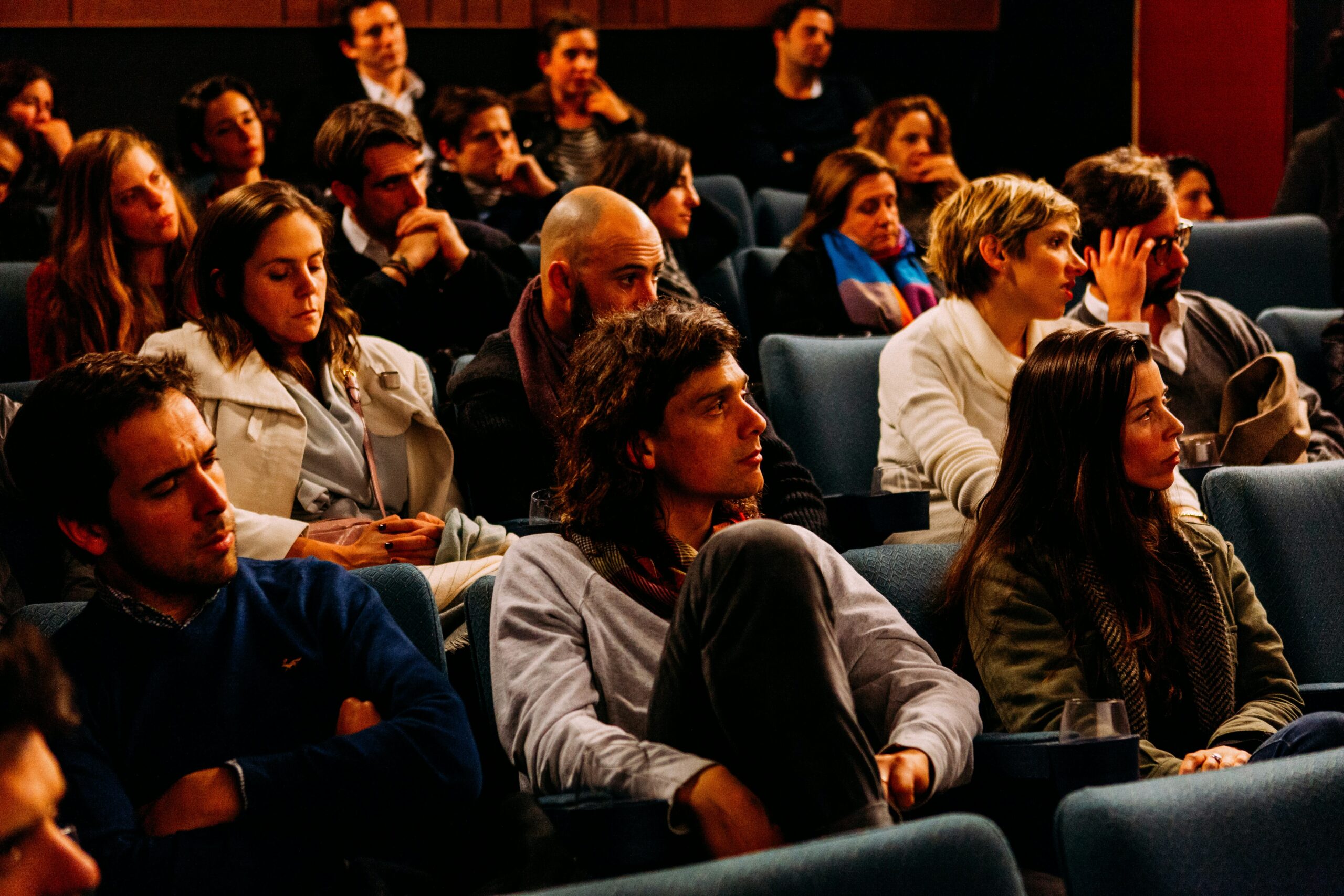 An audience watching a talk
